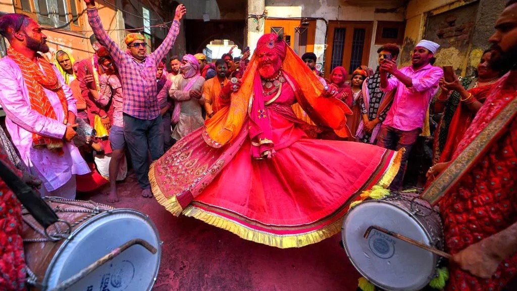 A Priest Dances In North India's Vrindavan City, Which Holds Special Celebrations On The Day Because Of Its Connections With Deities Krishna And Radha